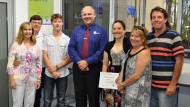 PhotoID:11922, Scholarship winners Jordon Irwin and Mattison Rose with their proud parents and Vice-Chancellor Professor Scott Bowman