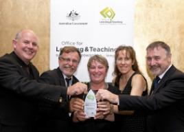 PhotoID:13629, 'Masked educator' Kerry Reid-Searl gains more national recognition for her innovative simulation techniques. L-R VC Prof Scott Bowman, Roger Searl, Prof Kerry Reid-Searl, Marlene Page and Prof Rob Reed