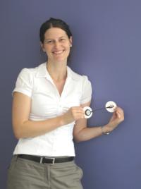 PhotoID:14206, Stephanie Schoeppe with a heart rate and activity monitor used in her research