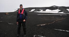 PhotoID:13934, Prof Bauer  at Deception Island, Antarctica, standing next to the former runway created and used by the Australian Hubert Wilkins from where he made the first powered flight in Antarctica (Photo credit: Thomas Bauer). 