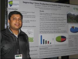 PhotoID:11485, Umesh Acharya with his poster