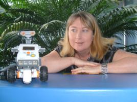 PhotoID:7332, Shontelle Lewis with one of her robots