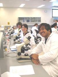 PhotoID:3922, The students in close-up are (foreground to background): Hasan Um, Kate Ward and Juan Esparza.