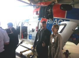 PhotoID:14785, Aviation senior lecturer Ron Bishop and Psychology lecturer Dr Talitha Best help escort the students visiting the AGL Rescue Helicopter