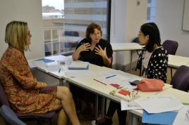 PhotoID:13798, Professor Alison Owens (left) and Professor Donna Lee Brien (middle) work with Huiyu (Emily) Gu who is a student of Master Professional Accounting. 