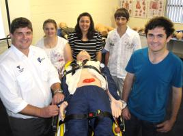 PhotoID:11768, Anthony Weber takes the students through the basics of Paramedic Science. L-R are Kelsey Smith from Chanel College in Gladstone, Amy Dowie from Blackwater High, Joshua Humphris from North Rockhampton High and Nic Johnson from Chanel College