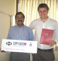 PhotoID:4023, Hamish Holewa with Dr Thomas Koilparampil,   Chief Editor of AJC and Head of Medical Oncology, Regional Cancer Care Centre, Trivandrum