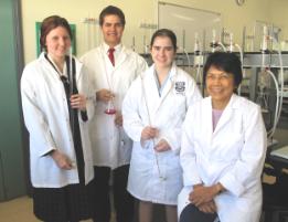 PhotoID:11249, CQUniversity senior lecturer Dr Vicky Vicente-Beckett welcomes L-R Madelyn Holmes (Rockhampton Girls Grammar),  Michael Dimitrov (Rockhampton Grammar School) and Liane Barnes (Rockhampton State High)  to campus recently for the regional Titration competition