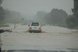 PhotoID:5312, Floodway between Emerald and Capella. The road was closed to all other cars except 4WDs, now it is closed completely as the water keeps rising. Photographer: Jodi Harrold. Compliments of ABC Capricornia.