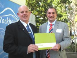 PhotoID:10848, Vice-Chancellor Scott Bowman and Capricorn Tourism & Economic Development Ltd Chair Grant Cassidy display the new investment brief