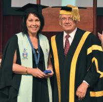 PhotoID:10537, Chancellor Rennie Fritschy congratulates Faculty medalist Dinah Richter who graduated with a Bachelor of Accounting/Bachelor of Business (Advanced Information Systems Management) with Distinction