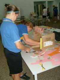 PhotoID:7987, Students work on their front of shop display in Designing in Fashion