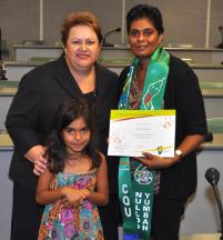 PhotoID:14191, Prof Bronwyn Fredericks congratulates Michelle Johnson, who brought her daughter to the ceremony. Michelle is now studying a Diploma of Business at CQUniversity