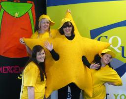 PhotoID:10929, Bachelor of Learning Management students (from left) Rhiannan Gane, Rochelle Scott, Anne Inglis and Amanda Salgado prepare for Friday's SID's Safety in Disaster Day at Kin Kora State School