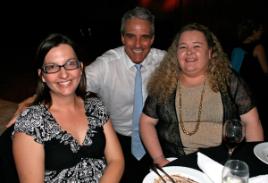 PhotoID:6995, Priscilla Crighton and Connie Moore enjoy a few laughs with comedian Steve Hadden at the conference dinner.