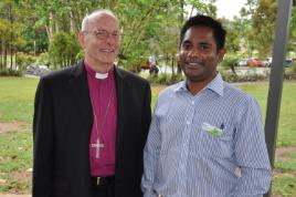 PhotoID:14046, Anglican Bishop Godfrey Fryar chats with Visiting Multi-Faith Chaplain Shaji Joseph before the official opening ceremony