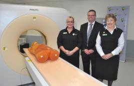 PhotoID:10879, Philips Queensland District Manager Greg Canty gets a personal tour from Cynthia Cowling and Kelly Spuur