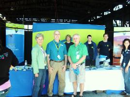 PhotoID:7452, Aviation Technology senior lecturer Ron Bishop (centre) joins John and Veronica Rickard in thanking the student volunteers. Mandy Finch from Bundaberg Campus is pictured right.