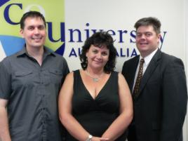 PhotoID:10465, Dr Pierre Viljoen (right) congratulates Dr Steven Pace and Anne Eaton in Mackay