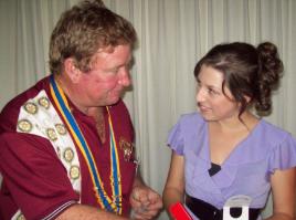 PhotoID:13155, Rotary Club of Mackay North President Greg Power congratulates Tiarna Burgess