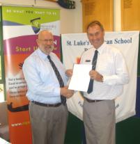 PhotoID:8128, CQUniversity Bundaberg Head Professor Phillip Clift (blue shirt) with St Luke's Principal Martin Oates