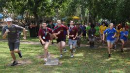 PhotoID:13436, Great Race participants hot foot it across campus