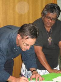 PhotoID:9214, Professor Kevin Ronan signs an MOU with Margaret Hornagold from the Darumbal Youth Services Inc.