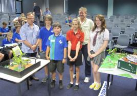 PhotoID:13732, Inspecting some of the prototypes are L-R Dr Steve Mullins (CQUni), Coen Jones (Yeppoon Primary), Conor Staines (Emu Park Primary), Samara St Henry (Parkhurst Primary), Innovative Regions Facilitator for CQ Ian Ogden and Abby Biles (Nth Rton High)