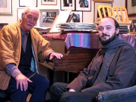 PhotoID:4553, Famous composer Ronald Stevenson sits with former CQCM student Steven Kenyon in his studio in Scotland