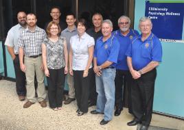 PhotoID:10379, Discussing flood victim support are L-R Masters students Mark Lorien,  Scott Hinton and Leonie Lorien, Professor Kevin Ronan, Simon Burgess (CQUni and Rotary), student Jennifer Rogers, Dr Will Reimer and Neil McDonell, Trevor McCubbin and Terry Loague (Rotary)