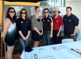 PhotoID:11948, Hail Creek Mine exhibited at the 2011 CQUniversity Open Day to promote the mine's scholarship and graduate program. Left to right, scholarship recipients Kahla Edwards (nursing), Hail Creek Mine's Stephanie McCracken, Hannah Austin (sonography), Hail Creek Mine's Rebecca Moolenbroek and Marie Cameron, and scholarship recipient James Mogg (engineering)