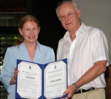 PhotoID:5259, Linda Ahern receives her Customer Service Award from Professor Rickard.