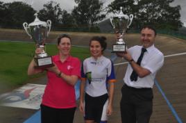 PhotoID:10222, CQUniversity's Community Engagement Coordinator Tamsen Clifford-Banks and Pro Vice-Chancellor Professor Rob Reed shine up the CQUniversity Cups with cyclist Alex O'Dea before the event in January next year.