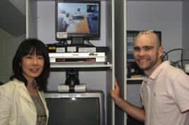 PhotoID:5166, Associate Professor Kanaho Matsuda gets a few tips about flexible course delivery by CQU's Chris Lucas.