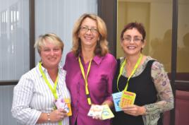 PhotoID:7182, Kerry, Lorna and Trudy with the range of  survival guides