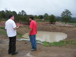 PhotoID:8383, Ben Kele (right) shows the Deputy Premier around the site