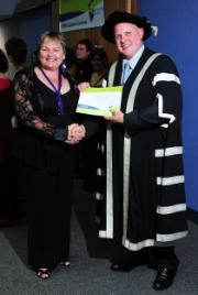 PhotoID:9839, Bettina Gray accepts her certificate. Photo courtesy Craig Chapman Photography                 