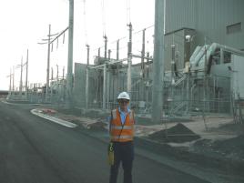 PhotoID:8287, Nathaniel in his work setting at Powerlink