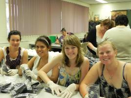 PhotoID:9703, From Left: Bree Bester, Kaitlyn Tass, Elise Davey and Hannah Wilson gather to help at the Mackay Campus