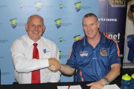 PhotoID:12327, CQUniversity Vice-Chancellor Professor Scott Bowman and SkyTrans Cairns Taipans General Manager Mark Beecroft shake hands after announcing their new partnership