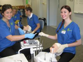 PhotoID:12267, Residential School students Bry Wilson (right) and Jessica Wehmeier get a chance to use the brand new gear