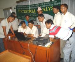 PhotoID:4742, Phul Subedi (in front of laptop) explaining  use of chemometric software