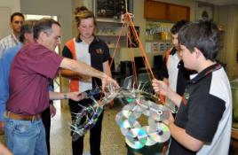 PhotoID:9456, Dr Noel Patson gets the Glenmore High class involved in his scuplture project