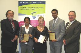 PhotoID:8774, Professor Tony Adams (left) and Professor Ken Hawkins (right) congratulate award recipients Ujwala Vidiyala, Susan Loomes and Krishan Rodrigo. Joint staff award recipient Dr Alison Owens is absent from the photo.