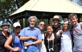 PhotoID:13804, In the Noosa Woods are Sue Davis (left), John Woodlock (centre) and Tracy, Sarah, Yuri, Josh and Jackson from UGA. Prof Michael Tarrant is at rear in the broad-brimmed hat
