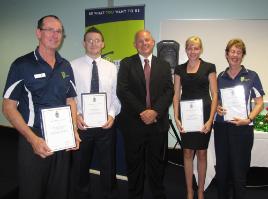 PhotoID:8137, Accepting their awards of behalf of Navigate CQUni are (from left) Mark Kennedy, Jason Bailey, Kylie Toon and Ros McCarthy (who also accepted flowers upon her retirement)